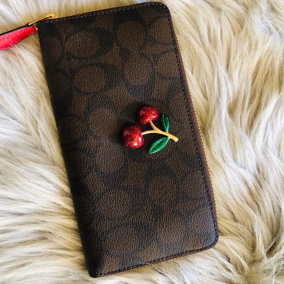 Coach Handbags - NWT Coach Signature Cherry zip around wallet